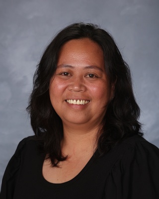 De Guzman, Emie