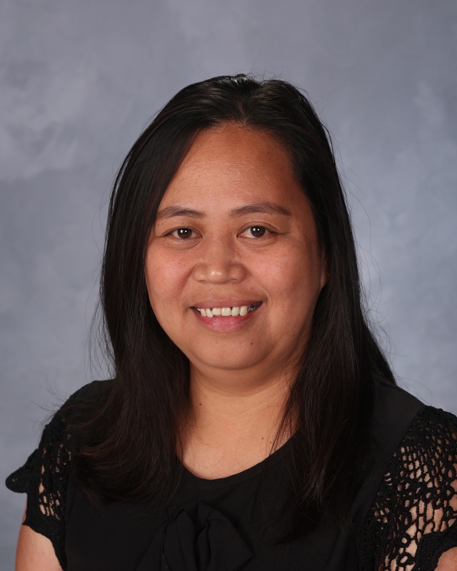 De Guzman, Emie